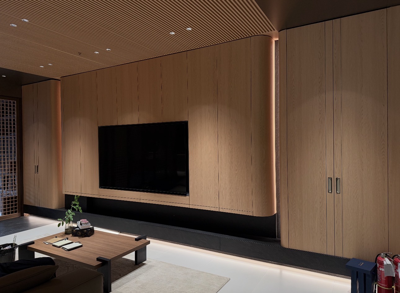 Custom wood TV wall and cabinetry